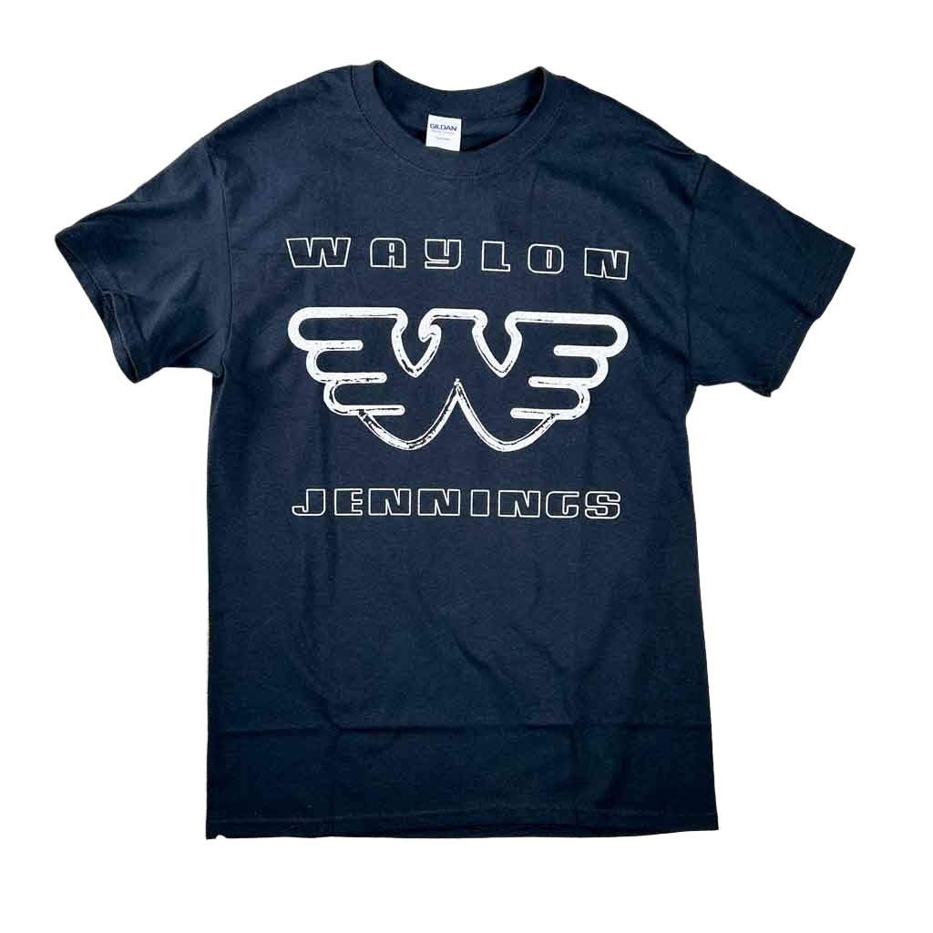 This Waylon Jennings T shirt with Flying W Logo featuring a simple but effective design. It says simply, "Waylon" above the flying W logo and "Jennings" beneath it. The lettering is white on a black shirt. It is made from 100% pre-shrunk cotton. This shirt comes in sizes Small to 3X.