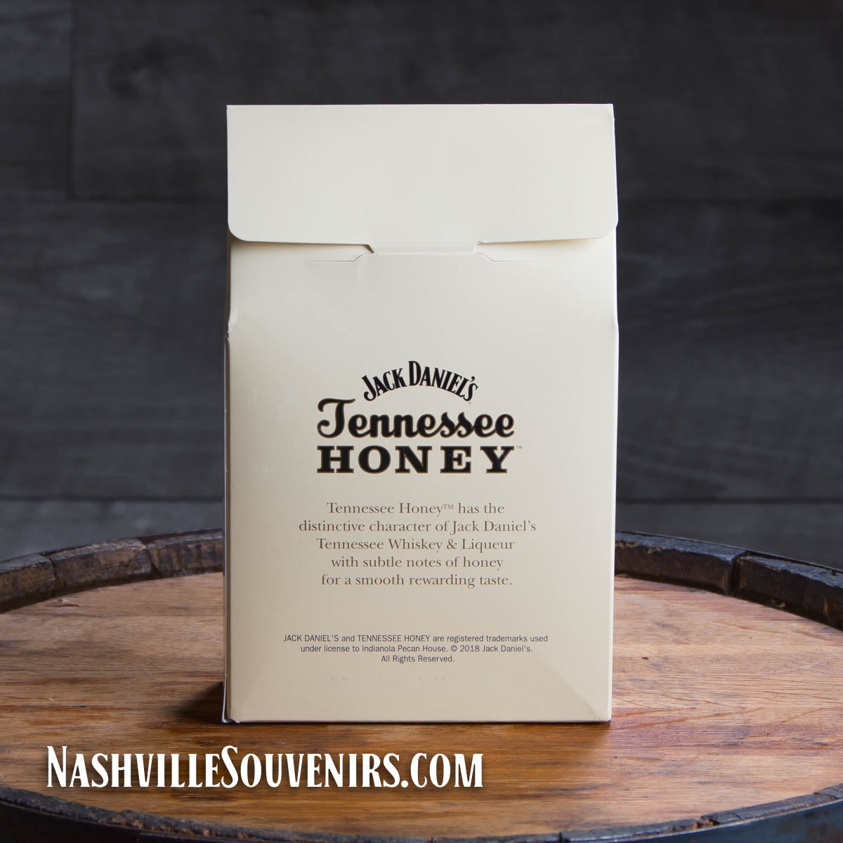 They don't come any sweeter than these Jack Daniel's Whiskey Tennessee Honey Pecans packaged in a resealable cardboard container displaying the Jack Daniel's swing and bug logo.