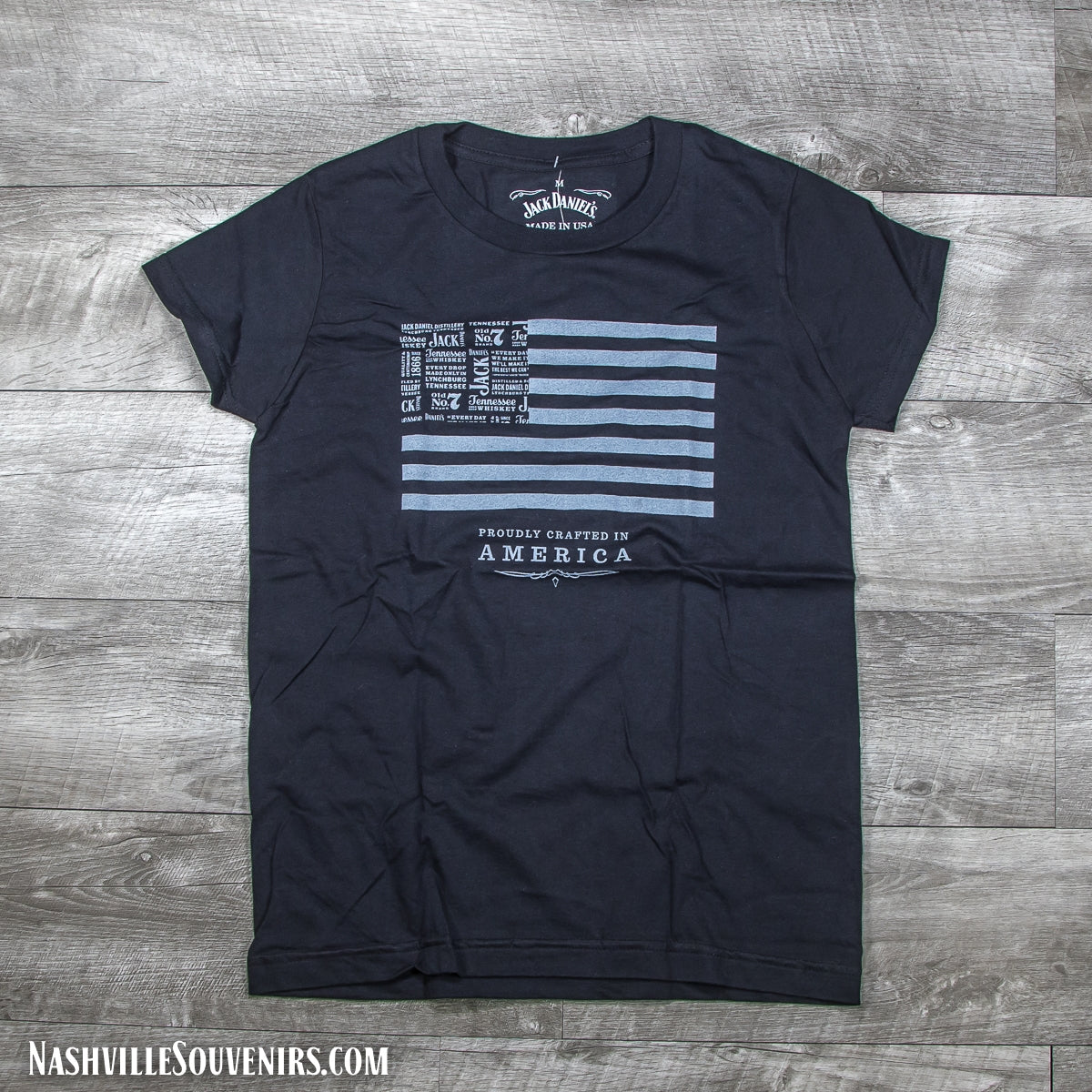 Officially licensed ladies Jack Daniels Crafted in America Flag T-Shirt in black. Get yours today with FREE SHIPPING on all US orders over $75!
