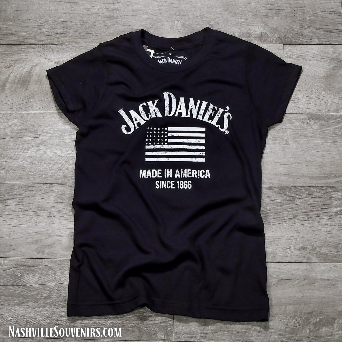 Officially licensed Women's Jack Daniels Made in America Flag T-Shirt in black. Get yours today with FREE SHIPPING on all US orders over $75!