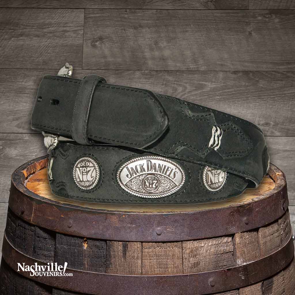 Hip view of a Jack Daniel's Rawhide Knot Western Belt with billets, Jack Daniel's conchos and a silver plated Jack Daniel's buckle in brown full grain leather.