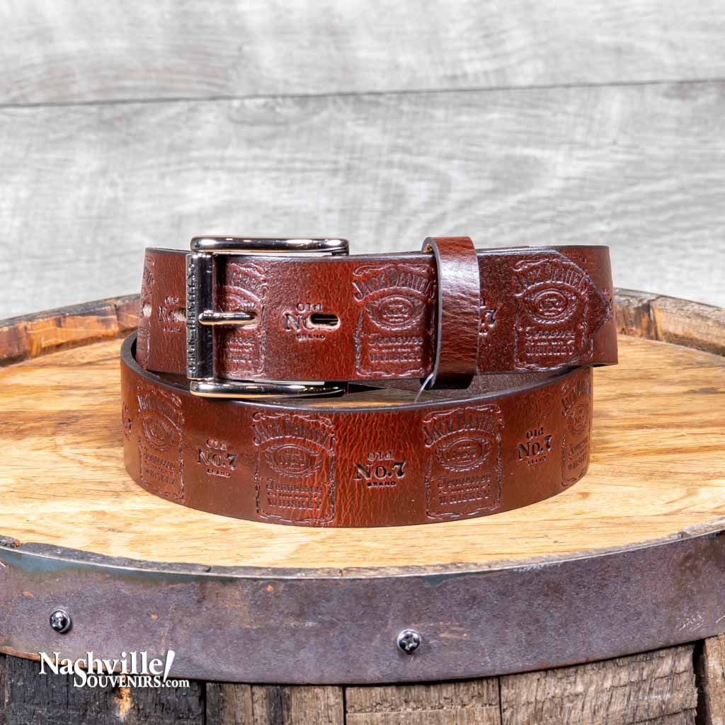 Dark brown officially licensed Jack Daniel's "Bottle Label" Logo Belt is a proudly "Made in the USA" belt that features the famous Jack Daniel's bottle label logo embossed around the entire perimeter of the belt. Each logo is also separated by an Old No.7 brand logo as well.