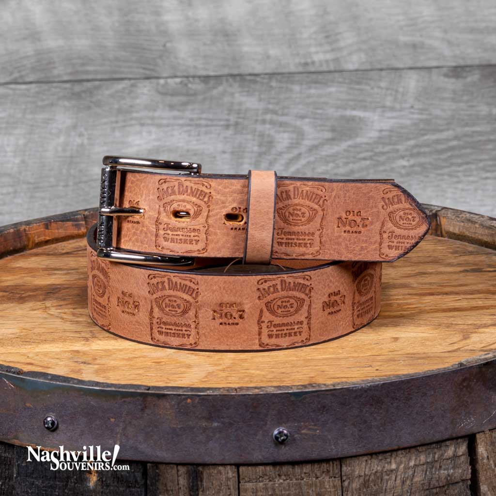 Natural color officially licensed Jack Daniel's "Bottle Label" Logo Belt is a proudly "Made in the USA" belt that features the famous Jack Daniel's bottle label logo embossed around the entire perimeter of the belt. Each logo is also separated by an Old No.7 brand logo as well.
