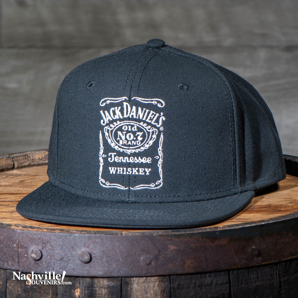 This Jack Daniel's flatbrim hat has the classic Jack Daniel's bottle label logo embroidered on the front crown. Turn it around and you'll find another embroidered Jack Daniel's swing and bug logo above the snap back closure.