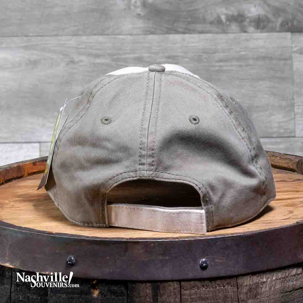Rear View -This Nashville Music City Cap features an oval patch with an embroidered Guitar and Nashville Music City stitched on a colored background. The Nashville hat has a stiff, rounded khaki colored bill in a relaxed fit vintage washed twill and a cloth front crown. The body has two matching front khaki panels and the remainder are in a darker olive green color.
