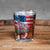 A new design Nashville Skyline and Flag Shot Glass printed with a colorful and scenic background of Nashville, TN with the American flag above.