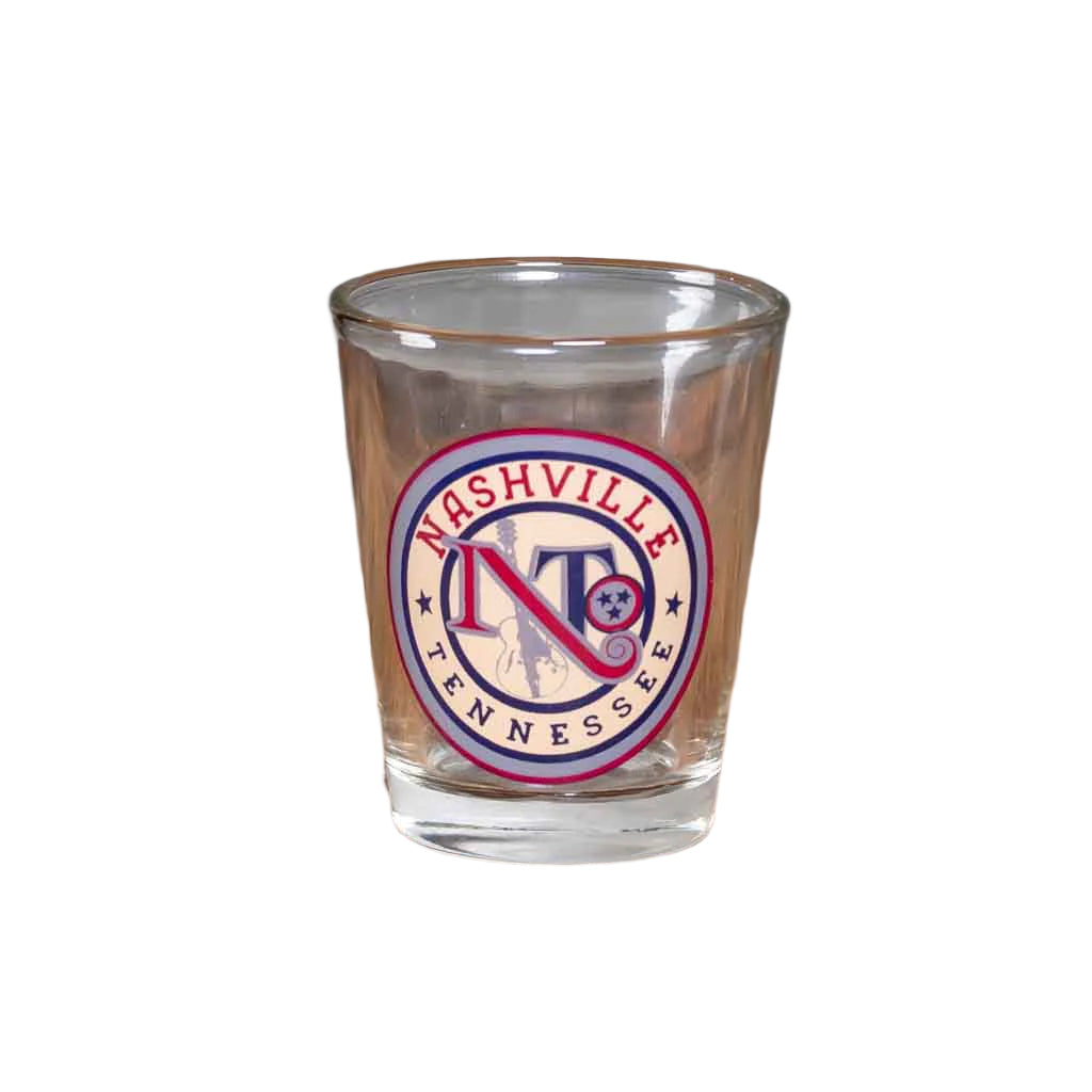 A new Classic Nashville Tennessee Shot Glass printed with a circular logo featuring Nashville Tennessee.