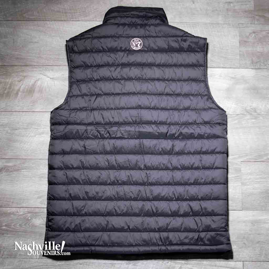 Officially licensed Jack Daniels Puffer Vest is made of soft shell nylon exterior with two front zip-up pockets. Has Jack Daniels logo embroidered logo on the front left chest.