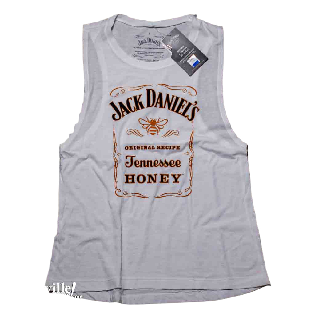 This officially licensed ladies white Jack Daniels Tennessee Honey Tank Top featuring the Tennessee Honey and gold Bee Logo. This is a beautiful ladies white tank top with the Jack Daniels Tennessee Honey logo printed in a light creme colored font that contrasts very nicely with the iconic gold bee in the center.