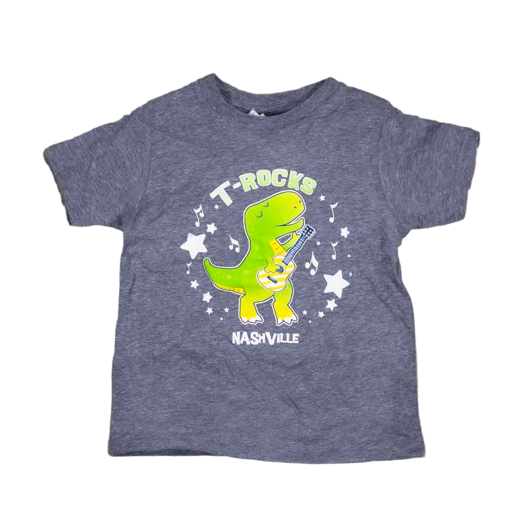Our kids "T-Rocks" Nashville T-shirt has been a big hit here in our store. It features a guitar playing T-Rex dinosaur in a colorful green and yellow logo design. The T-Rex is surrounded by white stars and music notes with "Nashville" printed below. Gray body color.