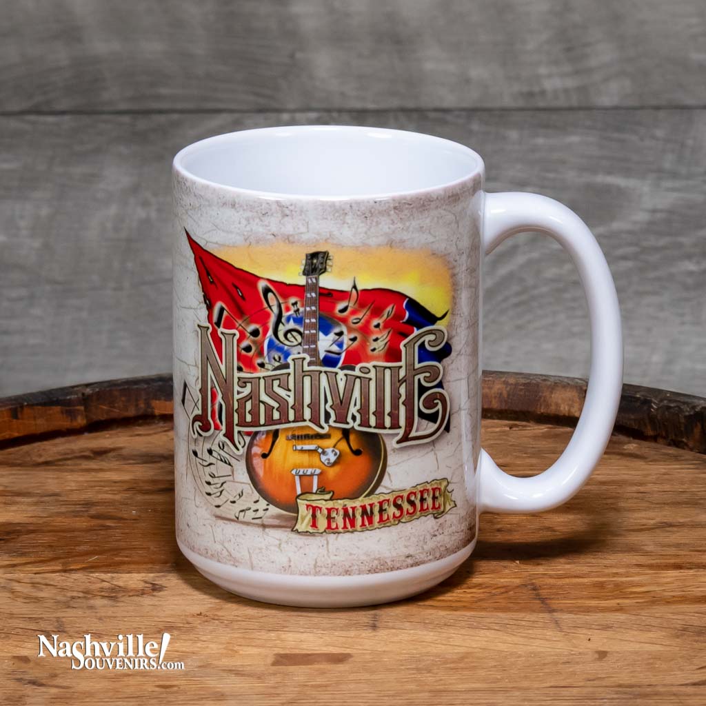A great new colorful Nashville Tennessee Guitar and Flag Mug design. This Nashville mug is beautiful, big and easy to grip. This design features a "Nashville Tennessee" set against a colorful background of an electric guitar and the state flag of Tennessee.