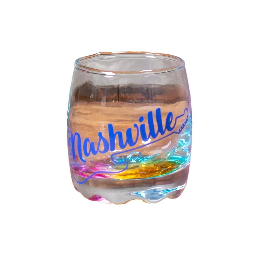 This Nashville Multi-Color Guitar Shot Glass features a bold Nashville logo with guitar and the bottom glass reflects many different colors.