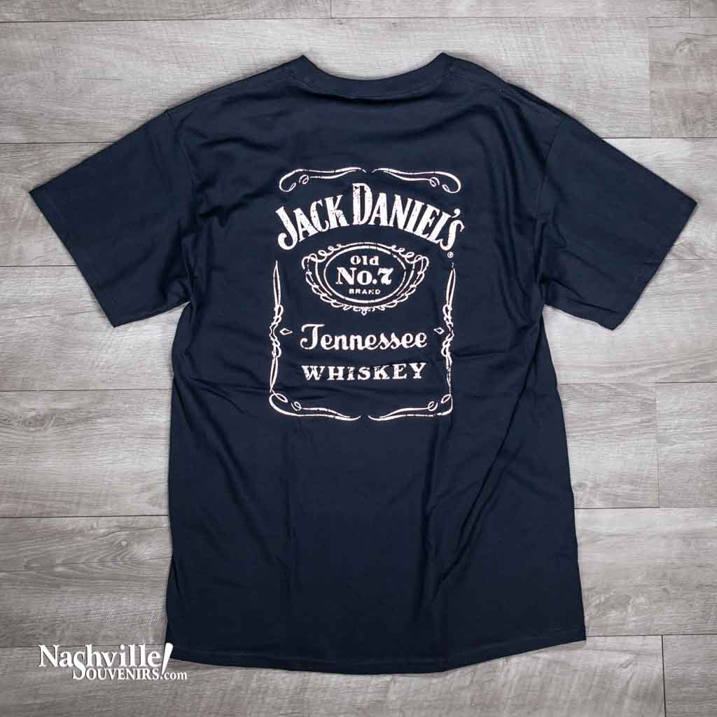 This is the old standard! A classic officially licensed Jack Daniels "Bottle Label" Tennessee Whiskey T-shirt. The front left chest area features the classic Jack Daniel's signature. The back of the JD shirt boasts a large and instantly recognizable Jack Daniels bottle label logo in a bold white design logo.