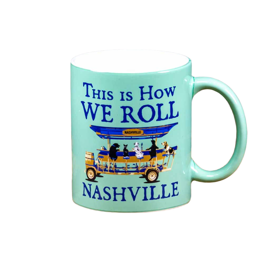 This "How We Roll in Nashville" coffee mug features a full wrap image that pays homage to the ever popular downtown Nashville pedal taverns.