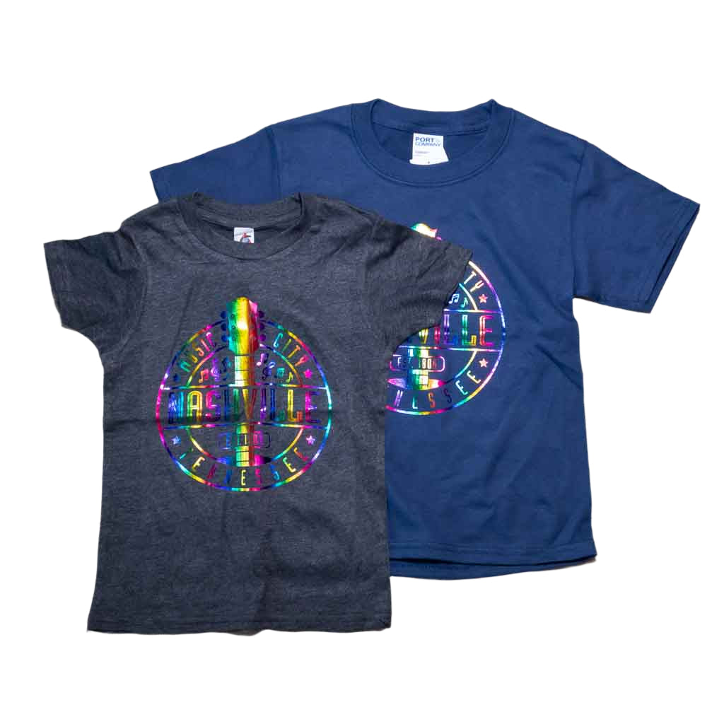 Our new design toddler "Music City Nashville Tennessee" T-Shirt features a colorful, reflective logo that includes a multicolor guitar surrounded by music notes. This shirt is available in either Navy or Granite and comes in toddlers sizes X-Small, Small, Medium and Large.