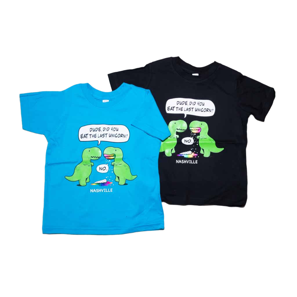 Black and Turquoise toddler "Last Unicorn Nashville" T-Shirt features a colorful logo that includes two dinosaurs discussing the mysterious demise of the last unicorn! Beneath the dinosaurs you'll find "Nashville".
