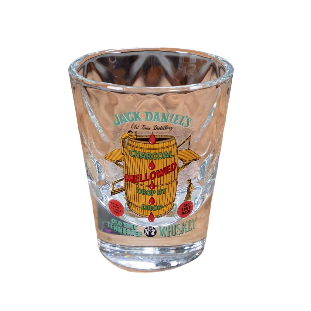 Close up view of an Officially licensed vintage Jack Daniel's "Charcoal Mellowed" shot glass is perfect for serving your favorite drink. This new Jack Daniel's glass is one of a series of JD collector shot glasses that feature exact reproductions of vintage Jack Daniel's logos used by the company on their products in days gone by.