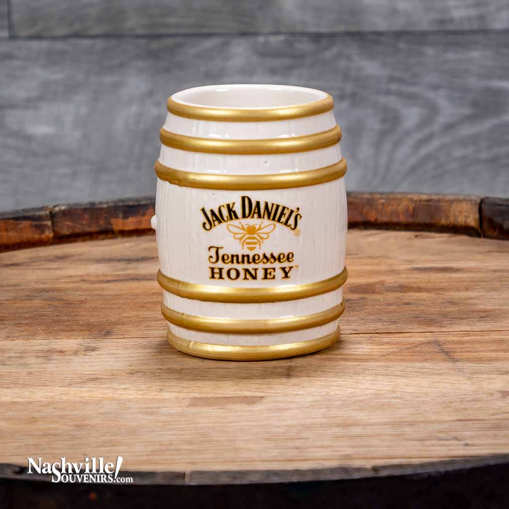 This collectible Jack Daniel's "Tennessee Honey" Stoneware Shot Glass is a new design for 2022 from Jack Daniel's. It features the famous Jack Daniel's honey bee logo.  It is a 2.5 oz stoneware JD shot glass that has been crafted to resemble their iconic whiskey barrels housed in the famous Lynchburg, TN