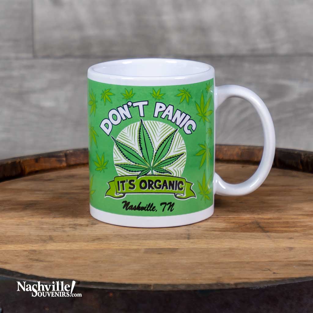 A new mug design, our don't Panic It's Organic Coffee Mug is one of many items you'll find in Willie's "green Room" collection.  The mug is 3 3/4" high and holds approximately 12 ounces.