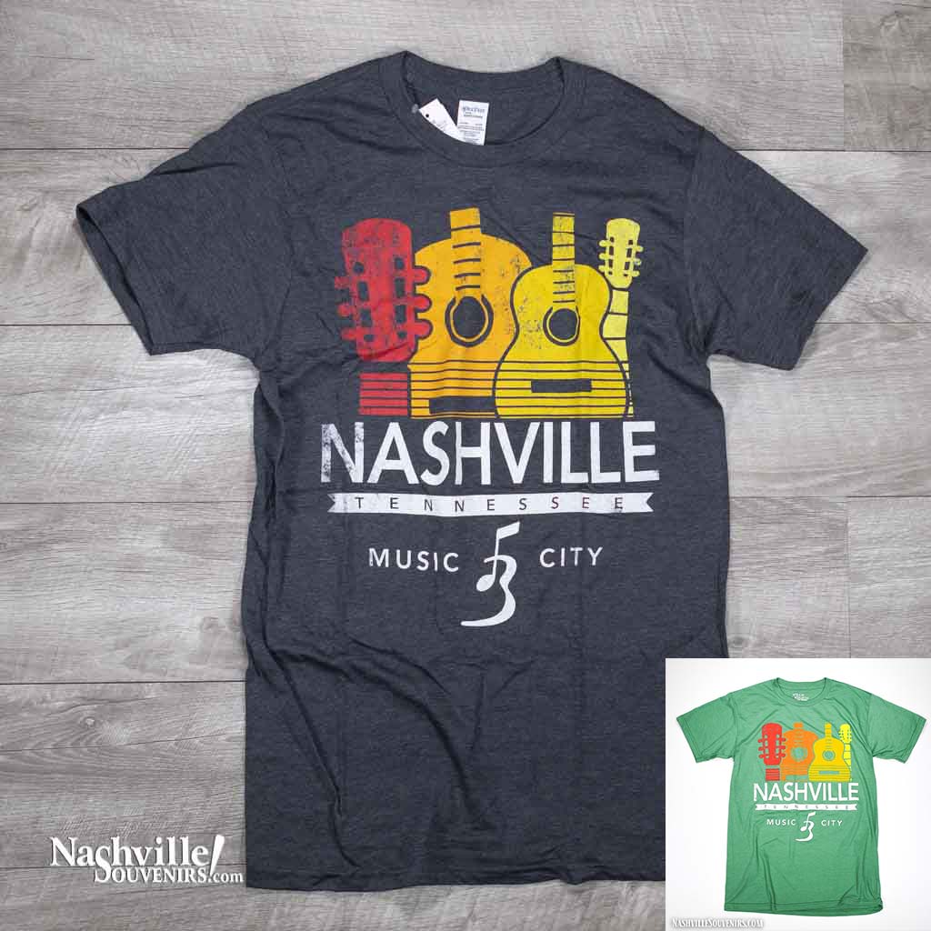 A great new bright and colorful Nashville Tennessee Music City T Shirt design featuring several acoustic guitars above the big headline NASHVILLE. Below that reads Tennessee and Music City above the guitar and music note logo.