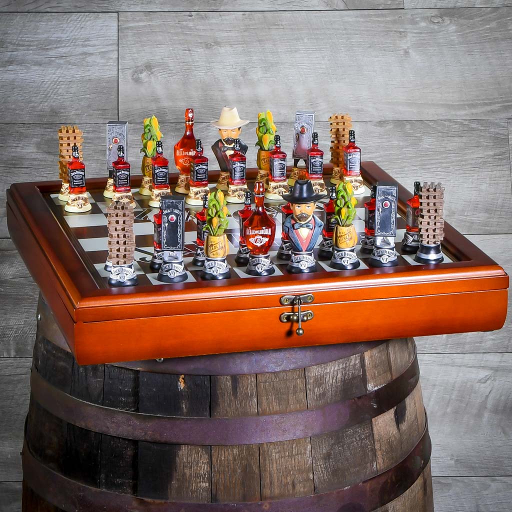 A Jack Daniel's chess set featuring a wooden carrying case.
