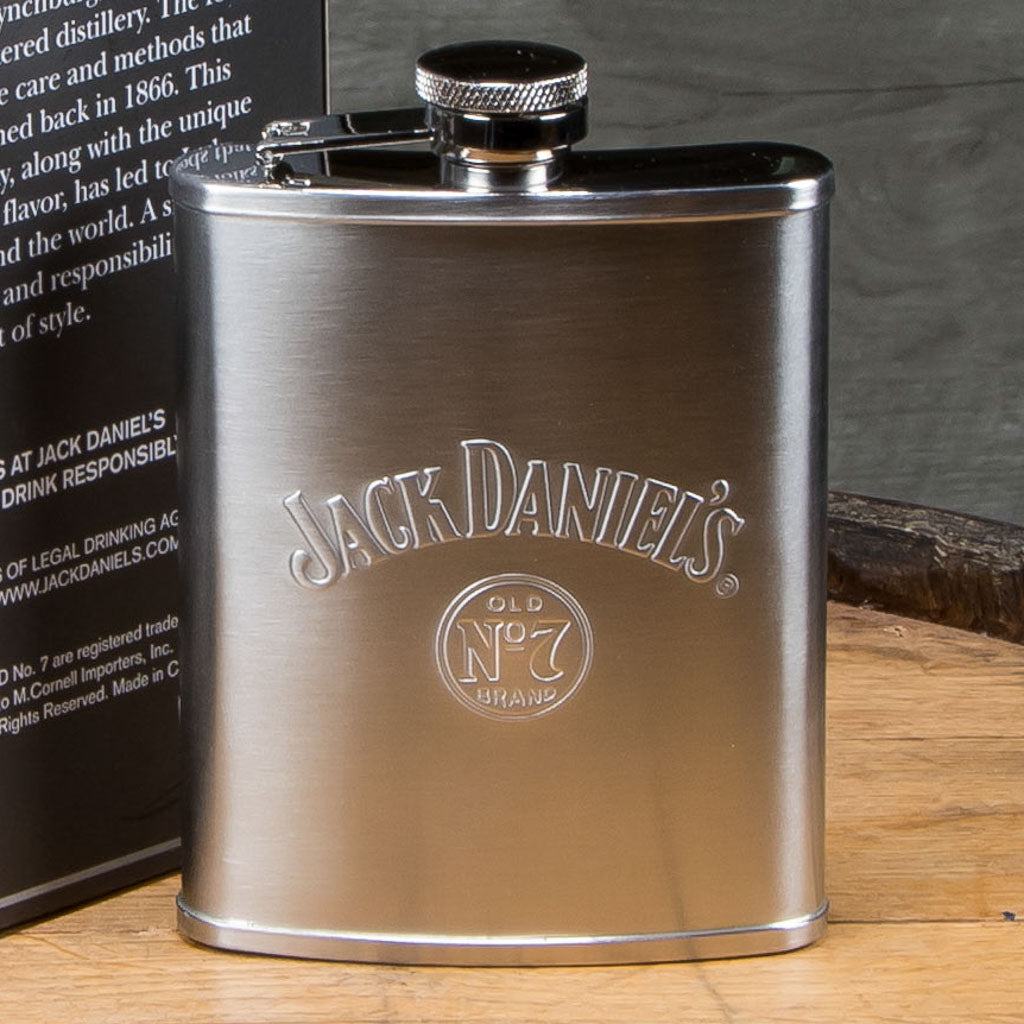 A Jack Daniel's flask in stainless steel featuring the swing and bug logo.
