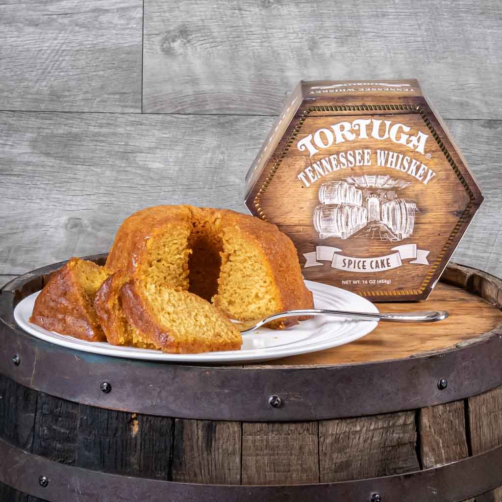 A beautiful view of a sliced Tortuga brand Tennessee Whiskey spice cake made with real Jack Daniel's whiskey and available for sale at NashvilleSouvenirs.com.