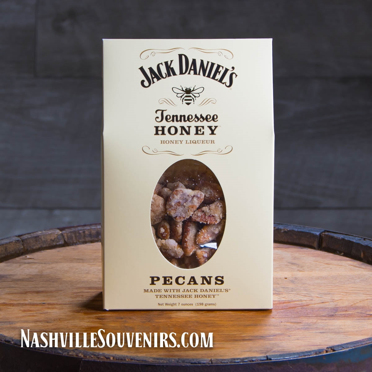 They don't come any sweeter than these Jack Daniel's Whiskey Tennessee Honey Pecans packaged in a resealable cardboard container displaying the Jack Daniel's swing and bug logo.