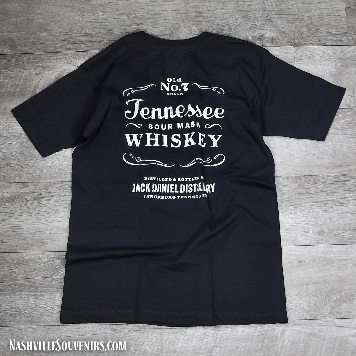 Officially licensed Jack Daniels Sour Mash Whiskey T-shirt. The back of the shirt has a large Old No. 7 Tennessee Sour Mash Whiskey logo. FREE SHIPPING on all US orders over $75!