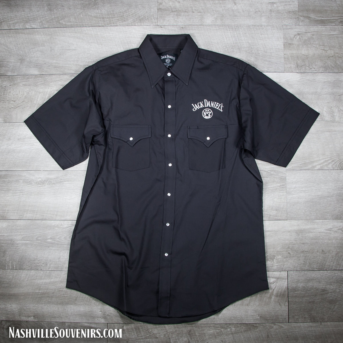 Officially licensed Jack Daniels Black Western Short Sleeve Shirt in black. Get yours with FREE SHIPPING on all US orders over $75!