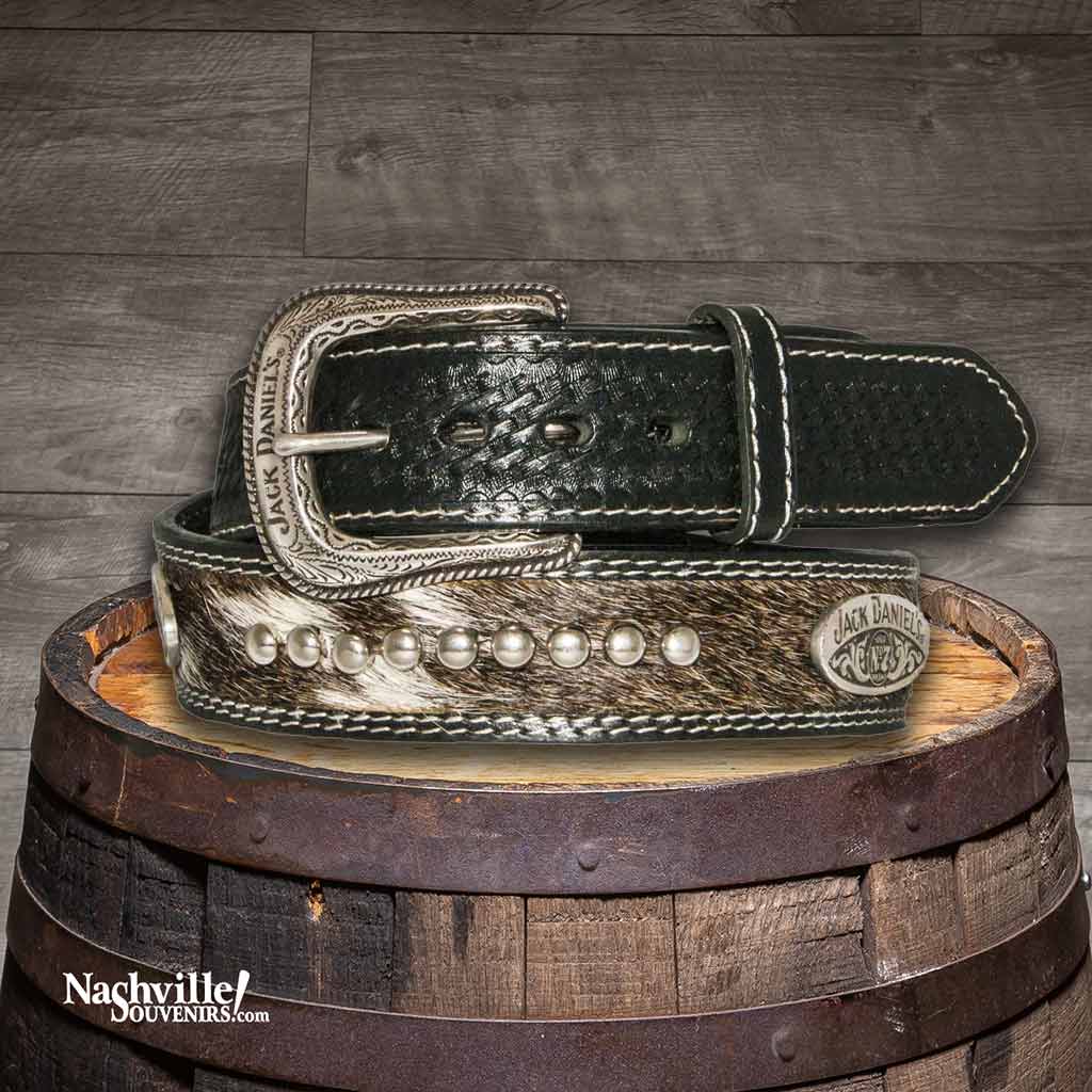 Jack Daniel's Hair-On Studded Belt with hand tooled tabs and ball studs. Also features a basket weave embossed pattern along with a silver Jack Daniel's buckle.