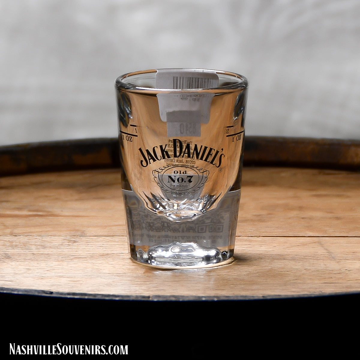Officially licensed Jack Daniels Prism Shot Glass. This is a great new shot glass, very heavy with faceted base to reflect the light. This shot glass features the Jack Daniel's Swing and Cartouche Logo printed in black.