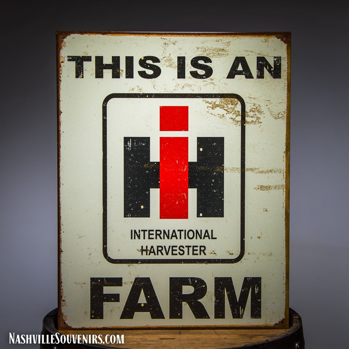 This is an International Harvester Farm Tin Sign