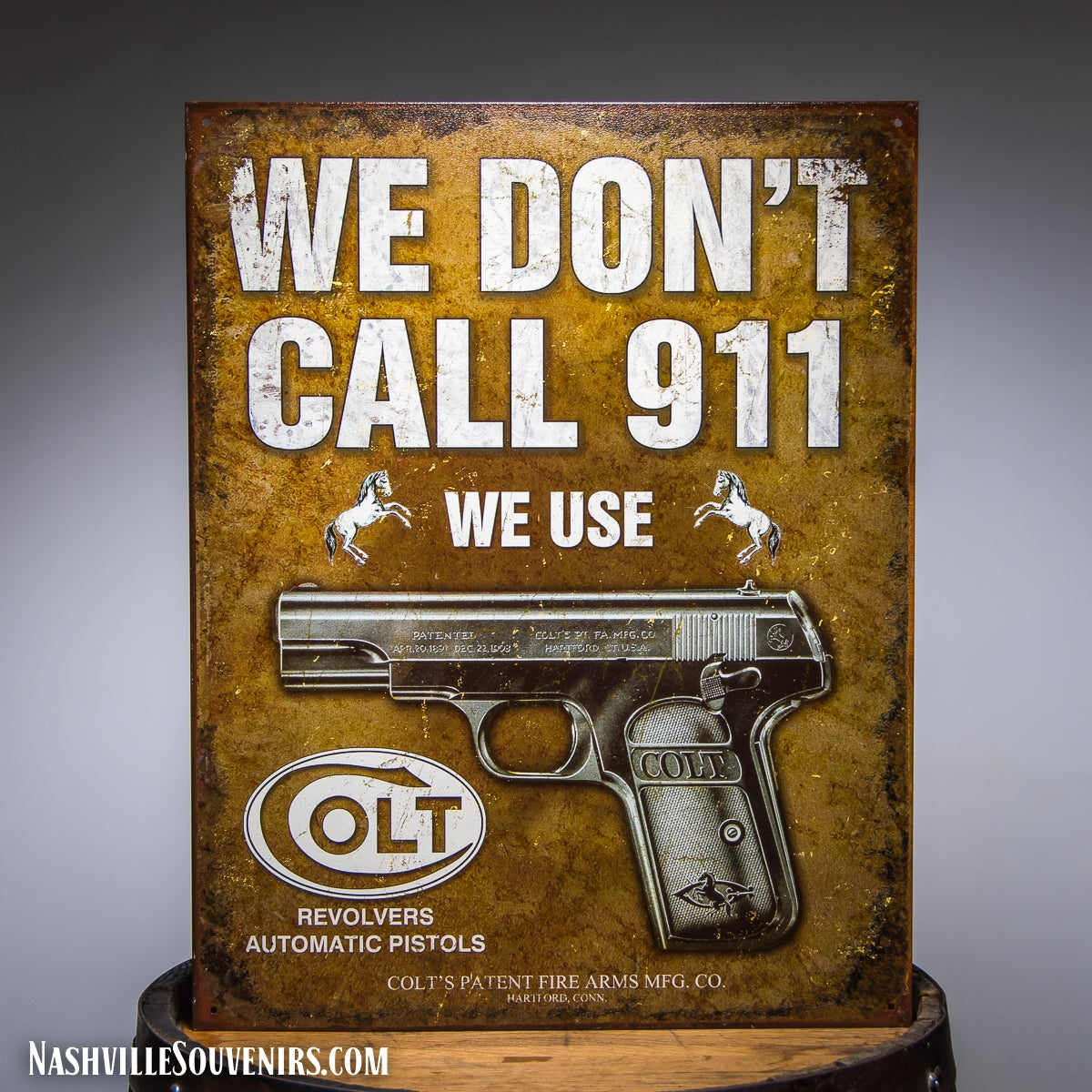 We Don't Dial 911 we use COLT Pistols Tin Sign
