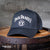 This Jack Daniel's mesh hat has the famous Jack Daniel's Old No.7 logo made from a rubberized material and secured to the front crown. Above that is the iconic Jack Daniel's swing logo in the same rubberized material.