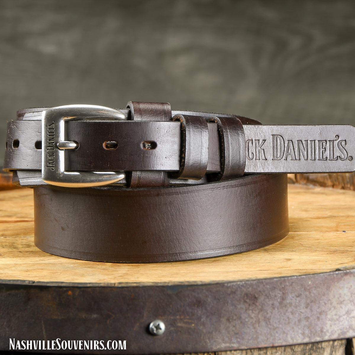 Officially licensed Jack Daniels Belt in Smooth Grain with Logos. This ia an overlay style belt with Jack Daniel's logo on the buckle and embossed on the end of the belt.