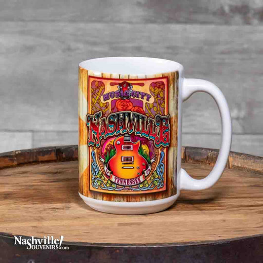This "Music City" Nashville TN Coffee Mug is a white ceramic mug with an easy to grip handle. The mug features a very colorful wrap around design highlighted by an image of an acoustic guitar.