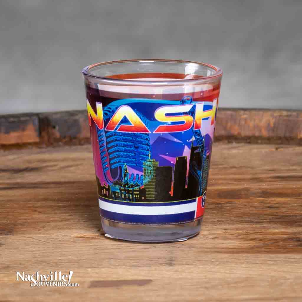 A new design Scenic Nashville Skyline Shot Glass printed with a colorful and scenic background of Nashville, Tennessee.