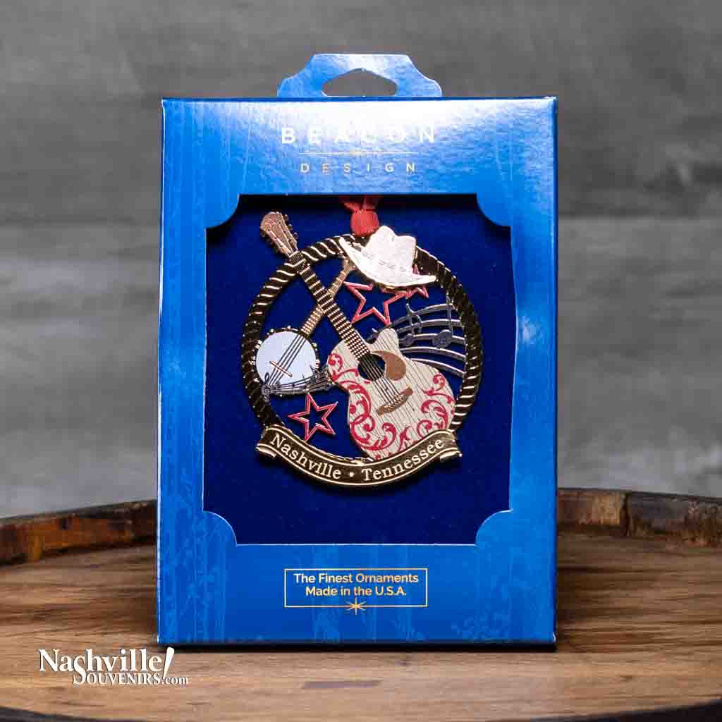 Our new Nashville "Country Music Collage" Collectible Ornament pays homage to the tools of country music featuring an acoustic guitar, banjo and Cowboy hat with stars and music notes.