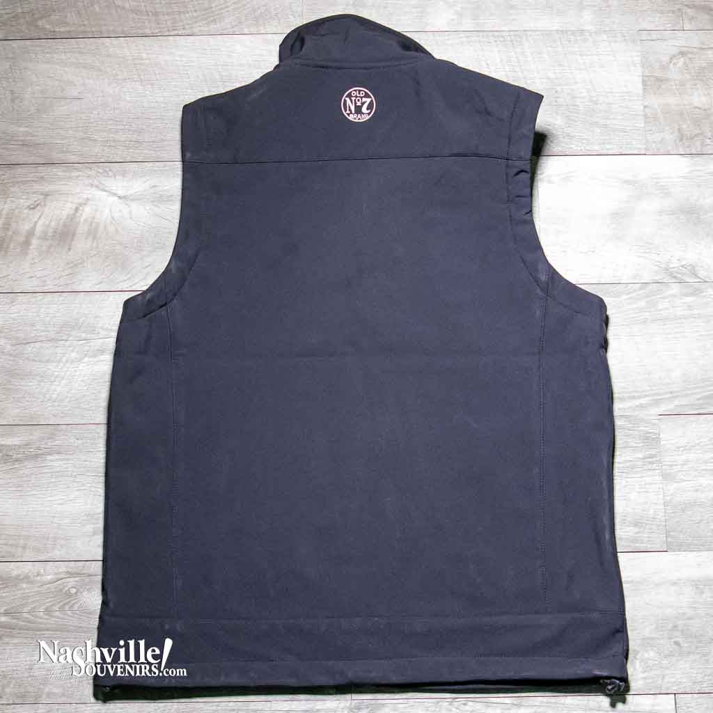 Back side ofOfficially licensed Jack Daniels vest made of soft shell polyester with a zip-up front. Has Jack Daniels embroidered on the front left chest and also has the circular Old No.7 Brand round logo on the back below the neck area.
