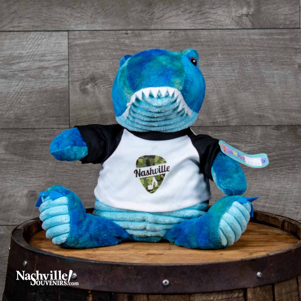 The kids are really loving our new colorful "Nashville" T-Rex Plush Toy. He's very bright and cheerful and stands (or sits!) about 9" high.