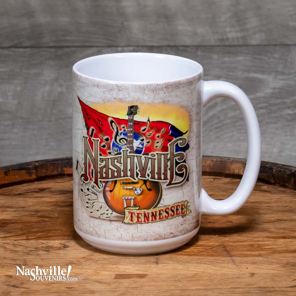 A great new colorful Nashville Tennessee Guitar and Flag Mug design. This Nashville mug is beautiful, big and easy to grip.   This design features a "Nashville Tennessee" set against a colorful background of an electric guitar and the state flag of Tennessee.