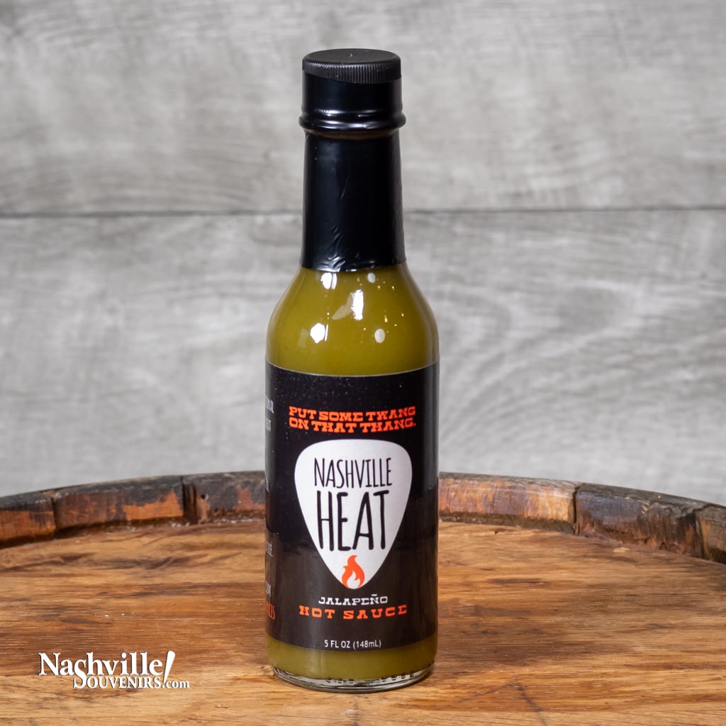 "Nashville Heat" Jalapeno Hot Sauce is a locally made all natural blend of jalapeno peppers and spices creating a traditional hot pepper sauce.  This hot sauce is in your face and full of surprises! As far as the heat goes, it is about a 6 out of 10 on the heat scale. 
