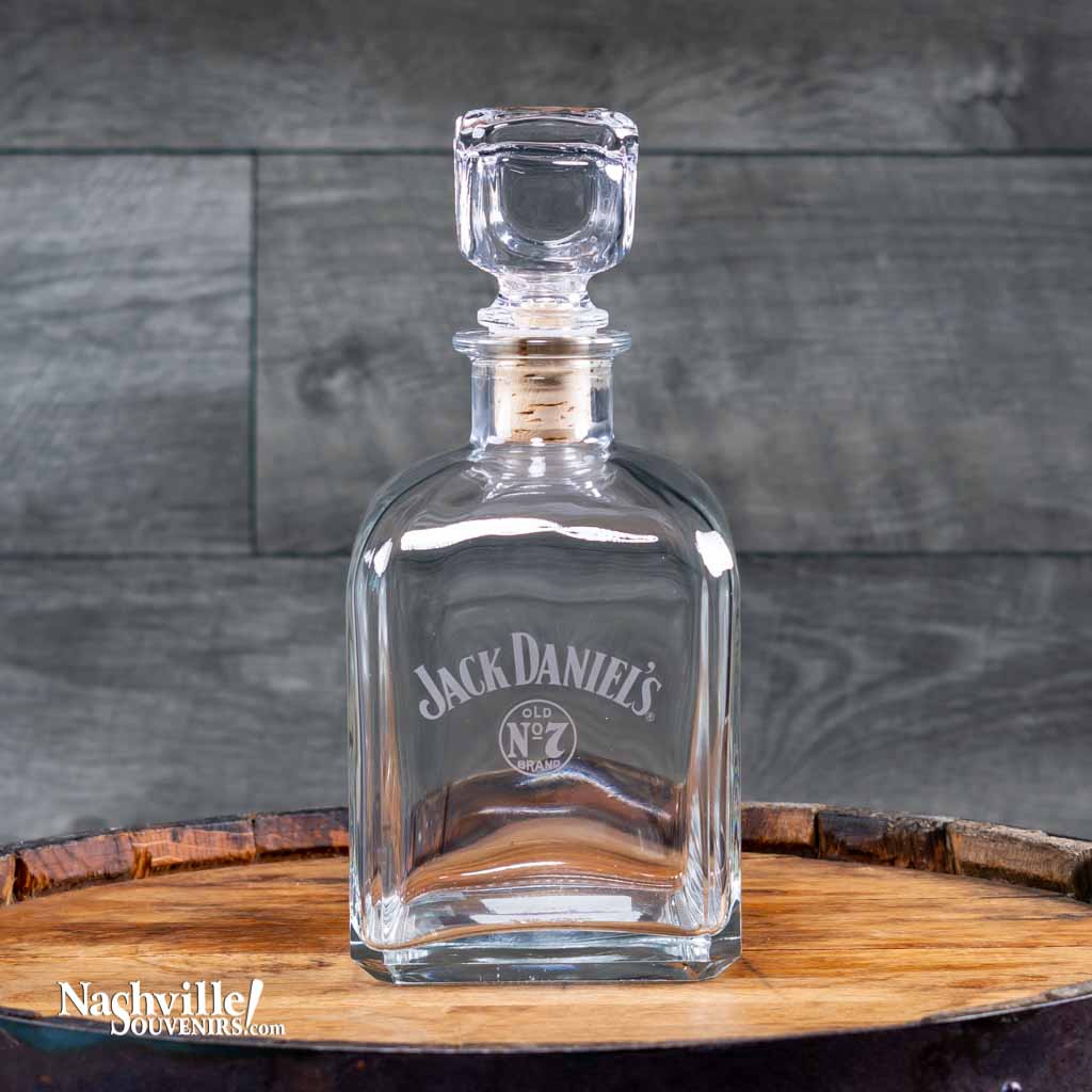 Collectible Jack Daniels Decanter with etched "Swing and Bug" Logo officially licensed by Jack Daniel's.The stopper is also embossed with the Old No.7 Brand logo, be sure and see alternate image for a close-up view. It's a work of art in itself.