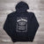 Officially licensed Jack Daniels Old No.7 Brand Black Hoodie with Old No.7 Brand Swing and Bug logo prominently displayed on the front. The rear of the JD hoodie features a large white bottle label logo.