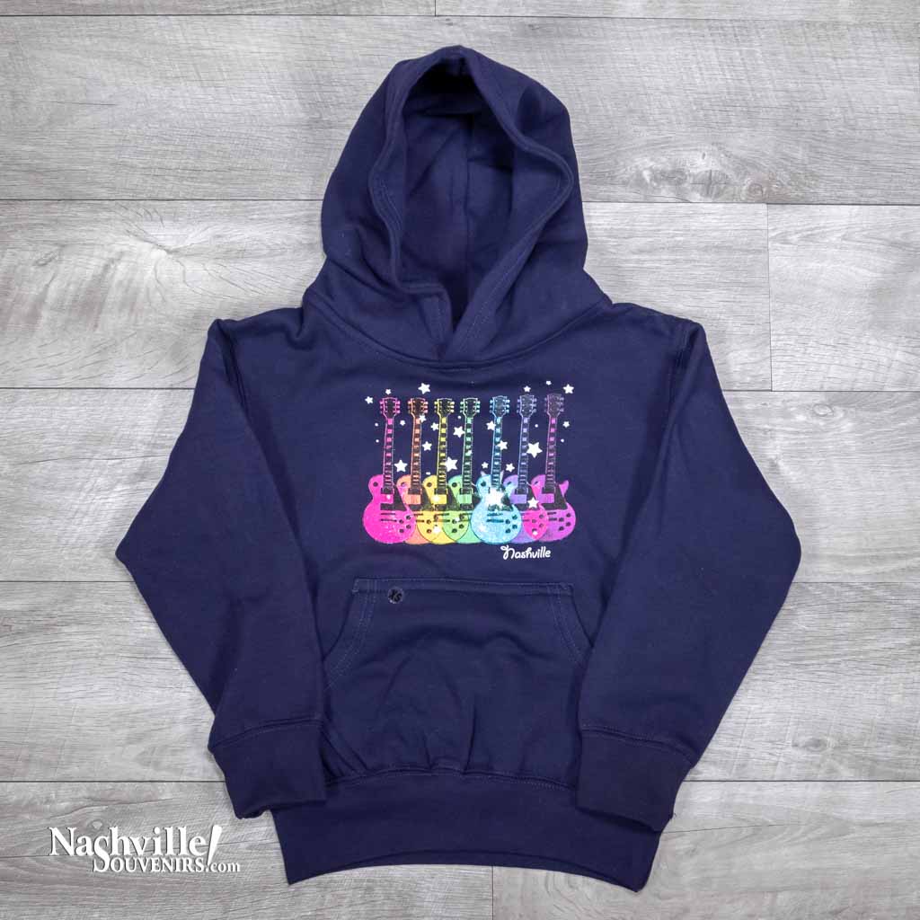 Our new colorful kids Youth "Nashville Guitars" Hoodie. This great hoodie features seven images of multicolor guitars surrounded by stars and glitter with "Nashville" printed below.