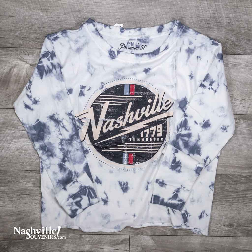 Our new design women's Long Sleeve Premium 51 brand "Nashville 1779 Tennessee" T-shirt. This great ladies Nashville t-shirt features a circular logo highlighting Nashville and its founding year and is emblazoned on a tie dye steel blue and white material.