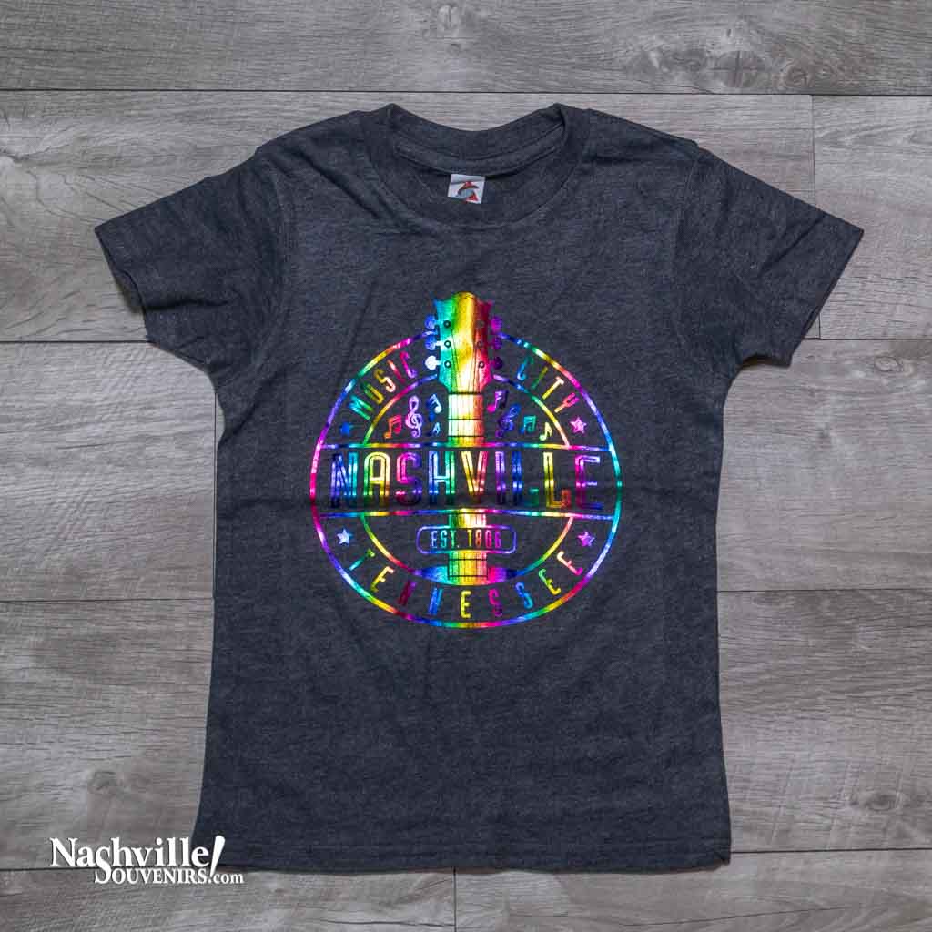 Our new design toddler "Music City Nashville Tennessee" T-Shirt features a colorful, reflective  logo that includes a multicolor guitar surrounded by music notes.  This shirt is available in either Navy or Granite and comes in toddlers sizes X-Small, Small, Medium and Large.