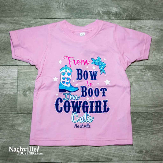 Our new design "I'm Cowgirl Cute Nashville" T-Shirt features a colorful logo that includes a cowgirl boot and a bow.  This shirt is available in pink and comes in toddler sizes 2T, 3T and 4T.