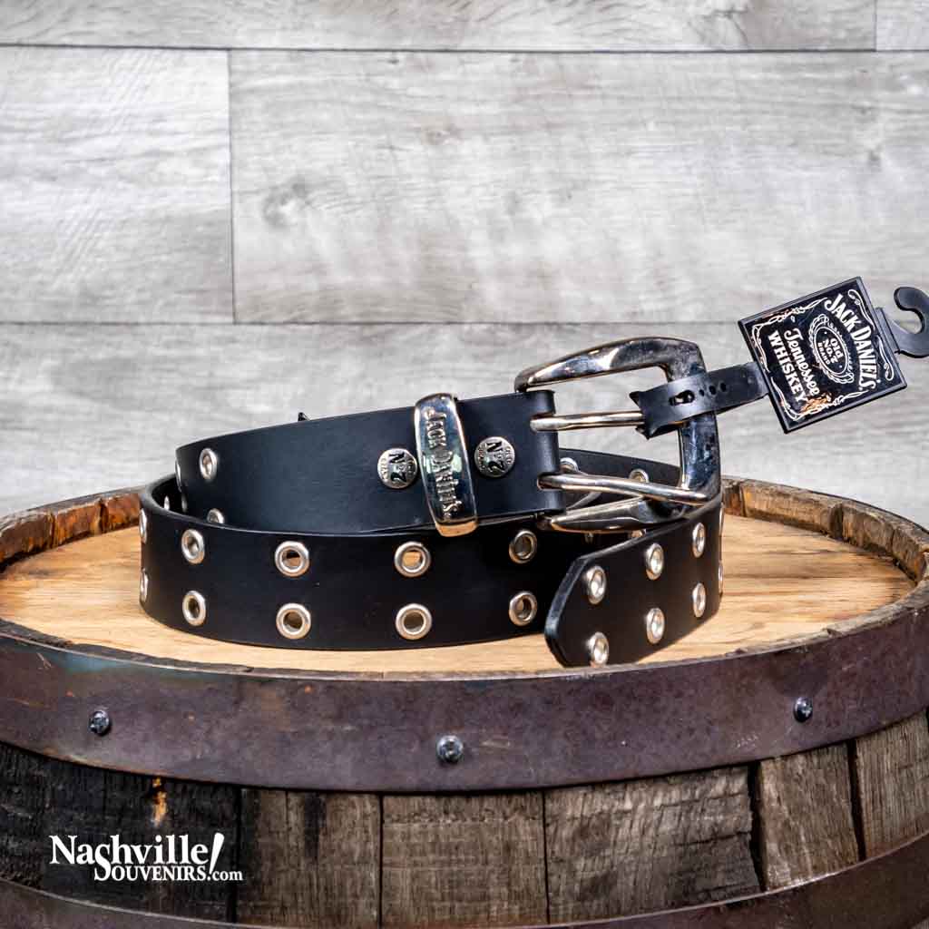 A great casual Jack Daniel's belt with double punched strap and dual rows of silver toned grommets around the perimeter. The JD belt is made from 1 1/2" full grain leather in black and features a Jack Daniel's roller buckle.